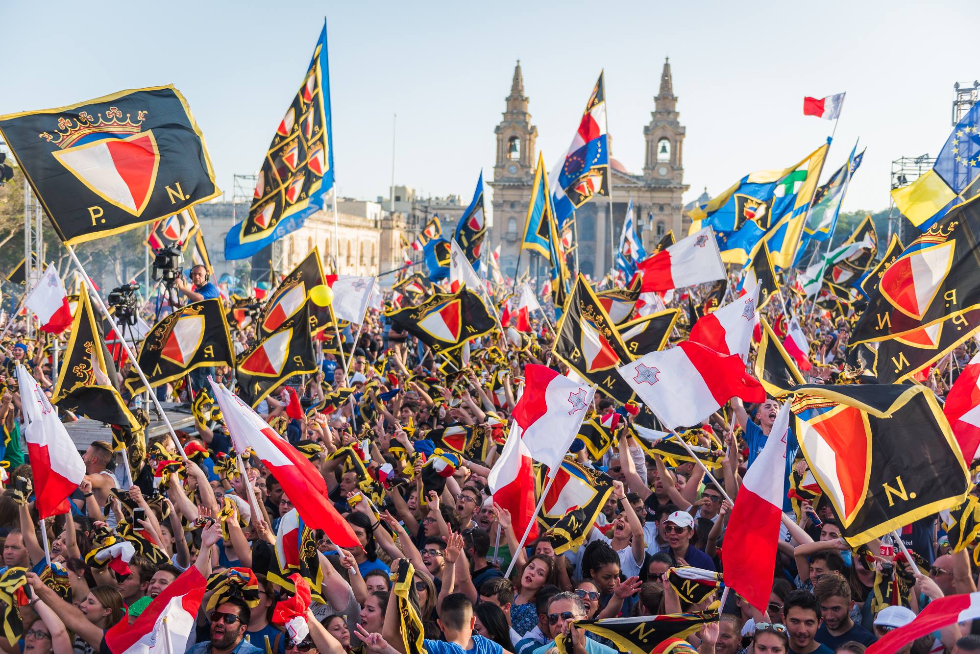 PN flags at a campaign event